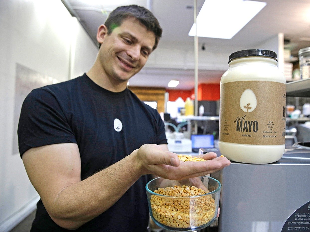 CEO Josh Tetrick holds a species of yellow pea used to make Just Mayo, a plant-based mayonnaise, at Hampton Creek Foods in San Francisco.